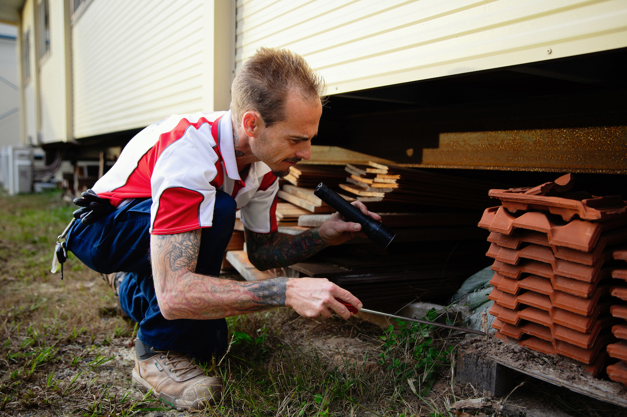 Joshua inspecting a house | Featured Image for Termite Barriers Brisbane Page on Pest Proofing Solutions